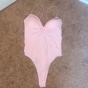 Pink bodysuit